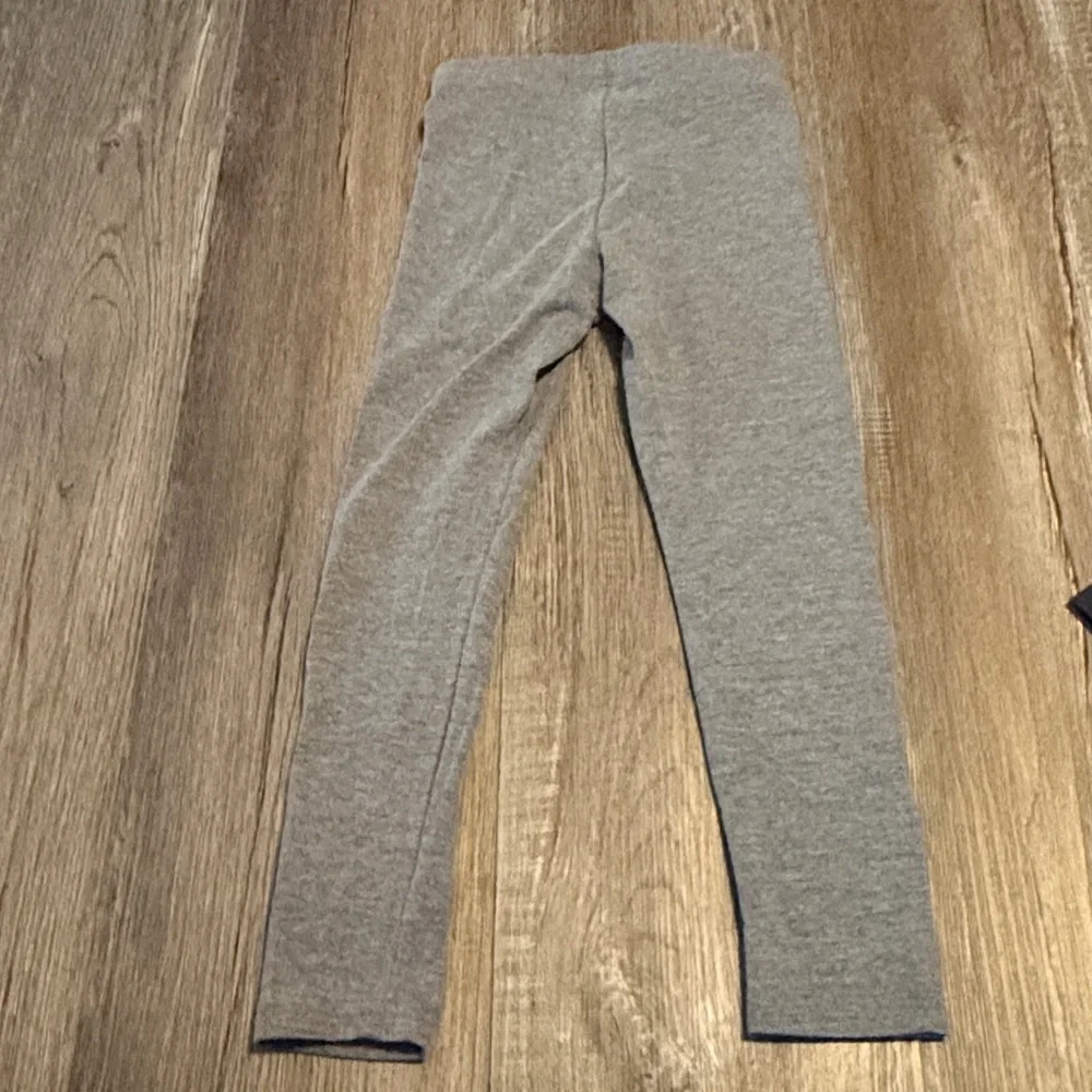Two pair Old Navy Girls Grey and Navy Leggings with Blue Heart Detail
